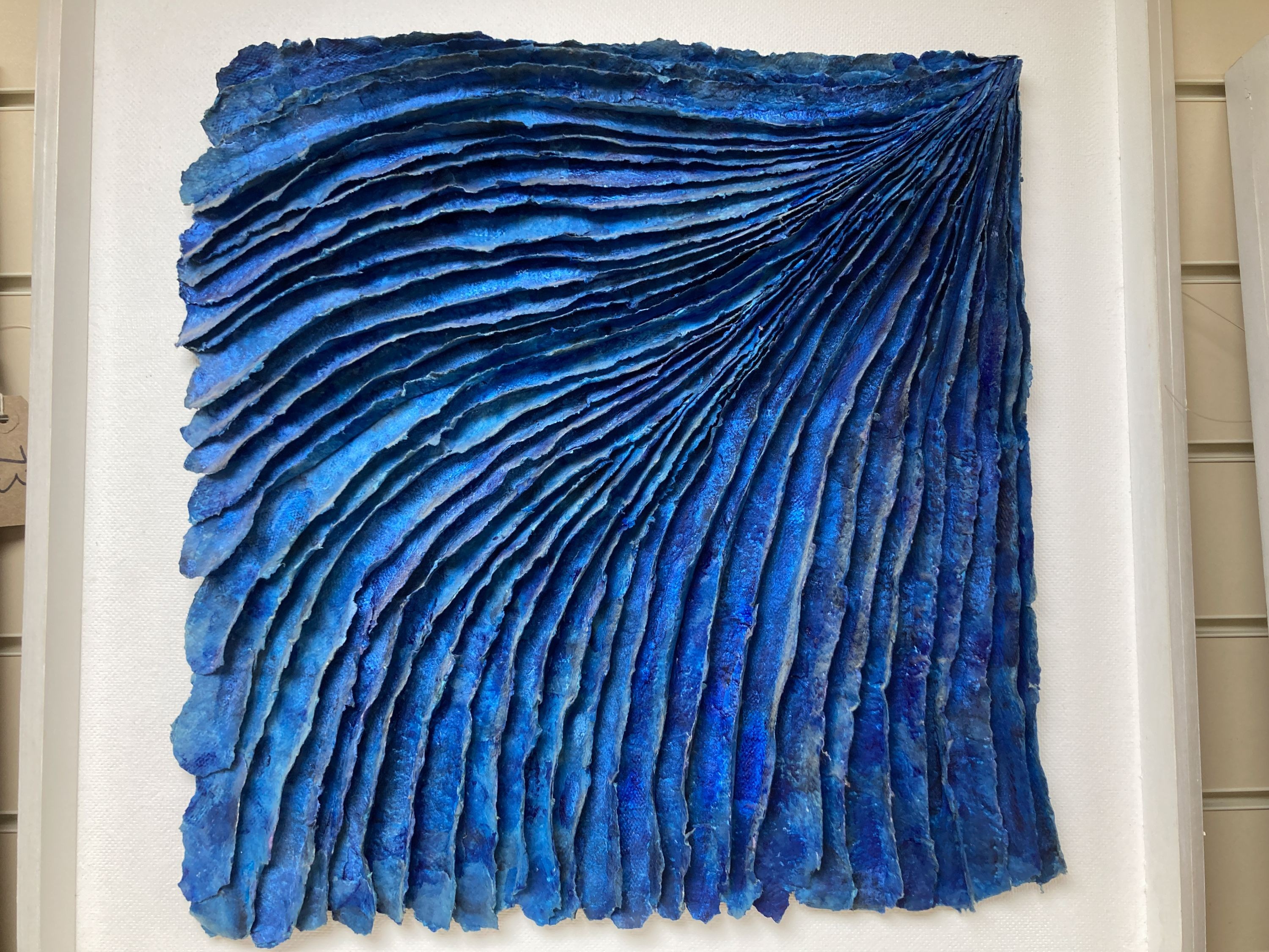 Barbara Frey (1909-2000), handmade paper sculpture, 'Confluence', label verso, overall 55 x 55cm.